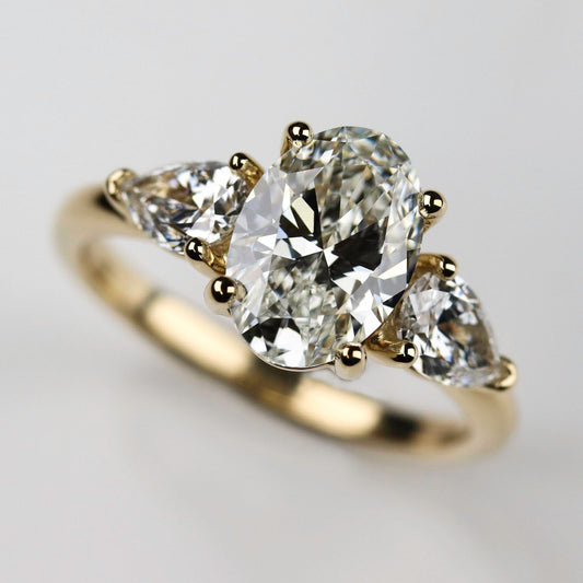 Three Stone Basket Engagement Ring